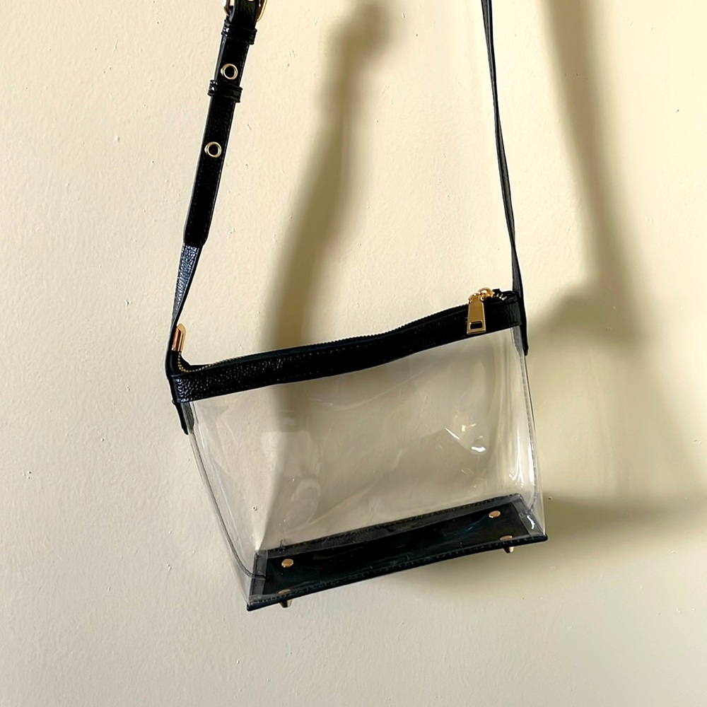 Clear crossbody purse with zipper.